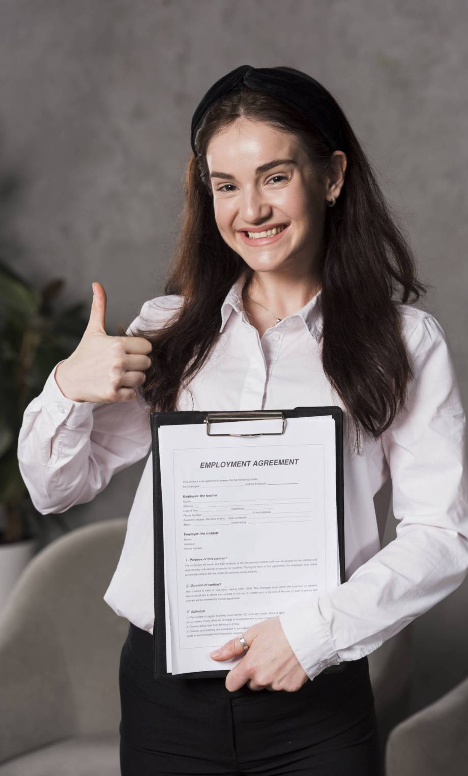 front-view-woman-holding-contract-giving-thumbs-up